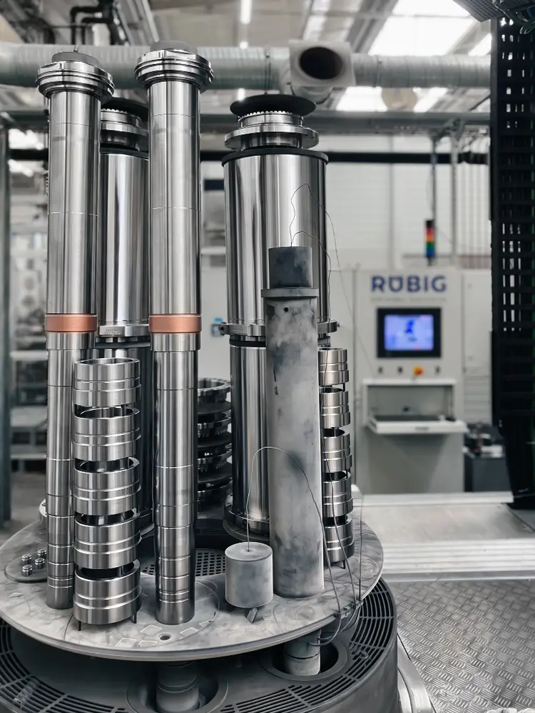 Components in a plasma nitriding system for surface hardening.