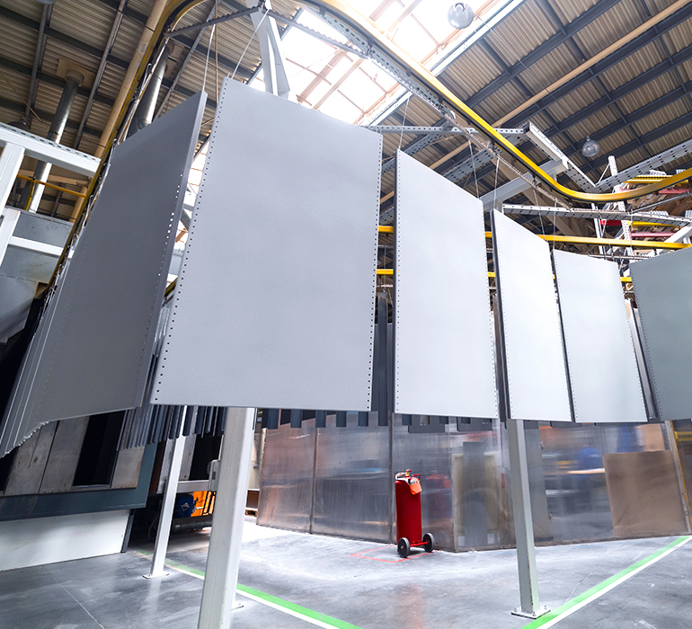 Powder coating system with metal components – industrial surface finishing at EMAG Production